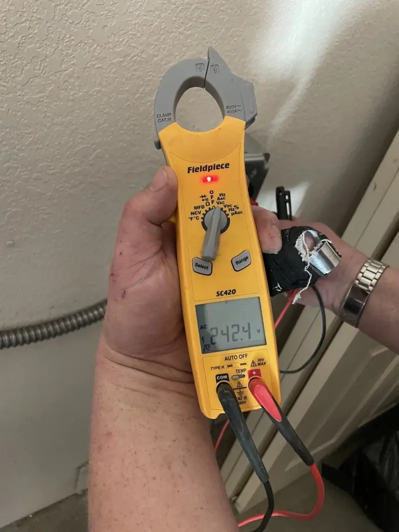 Voltage testing with clamp meter during Circuit Breaker Repair in Briar Creek